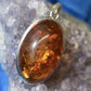 Ganesha Handicrafts-Amber. Pendant, Amber Pendants Jewellery for sale, Sale women's Amber Pendant. Fashion Amber Pendant, Women's trending Amber Pendant. Traditional Amber Jewellery. Orange colour Amber Pendant.
