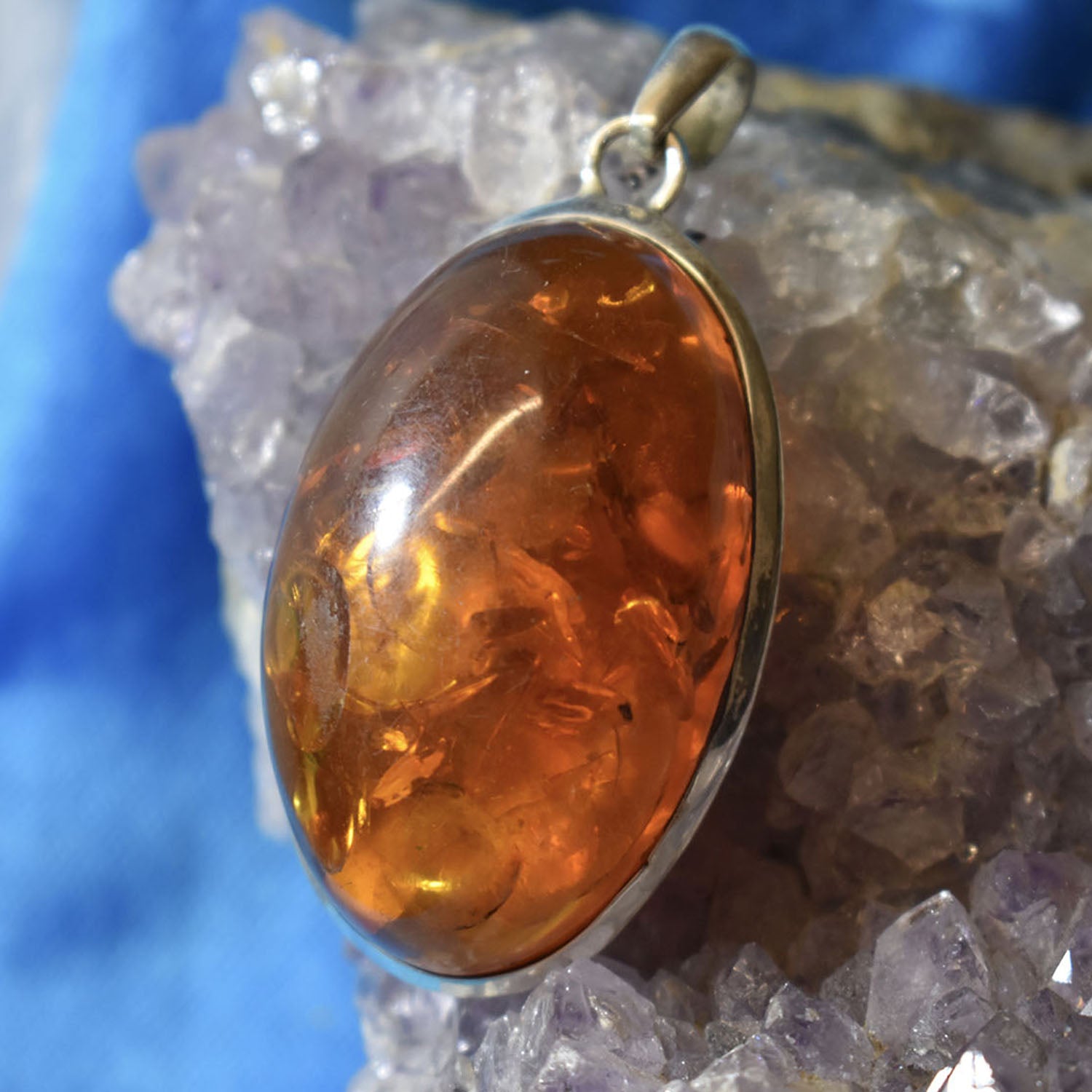 Ganesha Handicrafts-Amber. Pendant, Amber Pendants Jewellery for sale, Sale women's Amber Pendant. Fashion Amber Pendant, Women's trending Amber Pendant. Traditional Amber Jewellery. Orange colour Amber Pendant.
